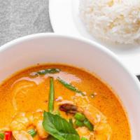 Panang Curry · Panang curry with kaffir lime leaves, chili, coconut milk, basil, string beans and peanut wi...