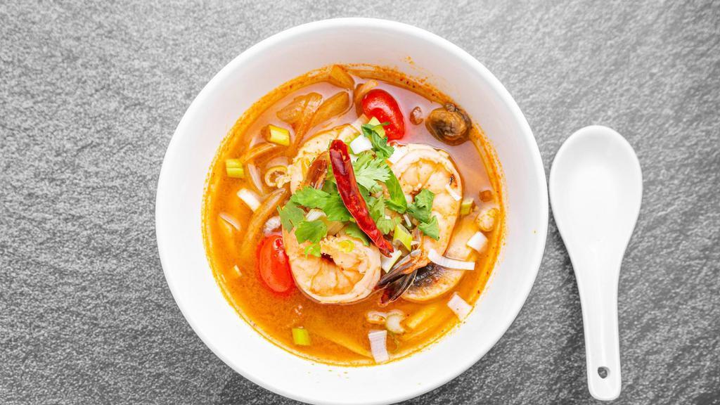 Tom Yum Soup · Spicy. Shrimp chili paste with fresh Thai chili, lemongrass, lime, onion mushroom and kaffir lime leaves.