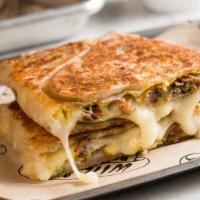 Veggie Scallion Pancake · Raclette, caramelized onions, and mushrooms, wrapped in a scallion pancake. Ginger Deluxe on...