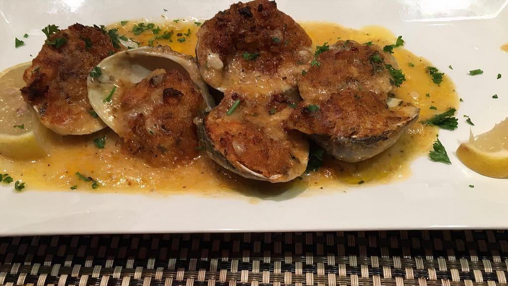 Baked Clams · Whole littleneck clams topped w/ seasoned breadcrumbs lemon wine sauce
