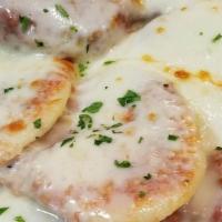 Baked Ravioli (6Pc.) · 6 of Our jumbo Cheese filled ravioli sauce & melted mozzarella.