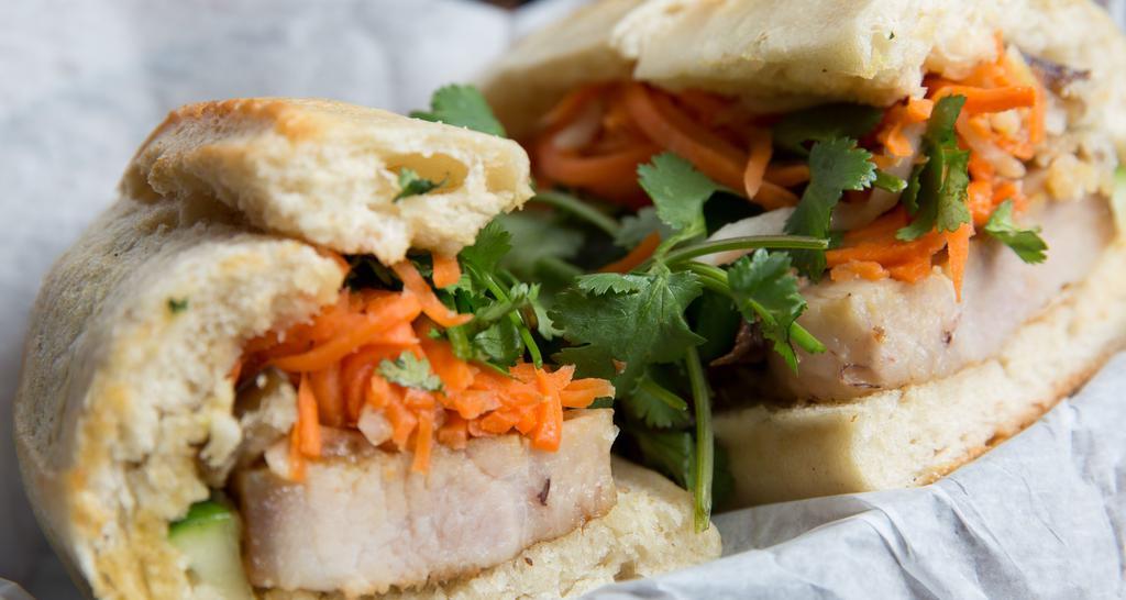 Pork Belly Sandwich · Pickled daikon, carrot, cucumber, and cilantro.