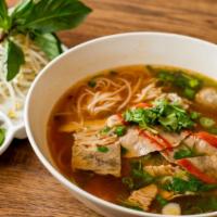 Spicy Phở · Hot and spicy. Beef eye round, brisket, omasum, tendon, and beef meatballs. Beef broth and r...