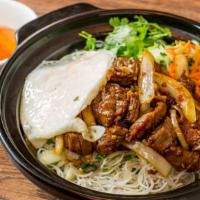 Bún Bò Lúc Lắc Ắp La · Shaken beef and fried egg. Rice vermicelli topped with scallion and fried shallots. Served w...