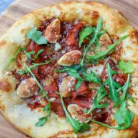 Fig Jam And Prosciutto · Housemade fig jam, fresh mission figs, prosciutto, baby arugula, evoo, parmesan, aged balsam...