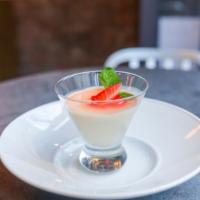 Strawberry Panna Cotta · Gluten-free. Strawberry coulis, vanilla, fresh strawberries, mint.