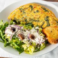 Mediterranean Omelette · Onion, tomato, spinach, feta cheese served with a Greek 