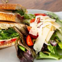 Spring Capri Panini · Choice of chicken or prosciutto 
fresh mozzarella cheese, grilled pinapple, roasted red pepp...