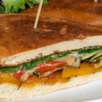 Veggie Panini · Grilled zucchini, roasted red peppers, roasted butternut squash, baby spinach, grape tomatoe...