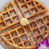 Belgian Waffles · Honey-whipped butter, powdered sugar, pure maple syrup, fresh cut seasonal fruit.