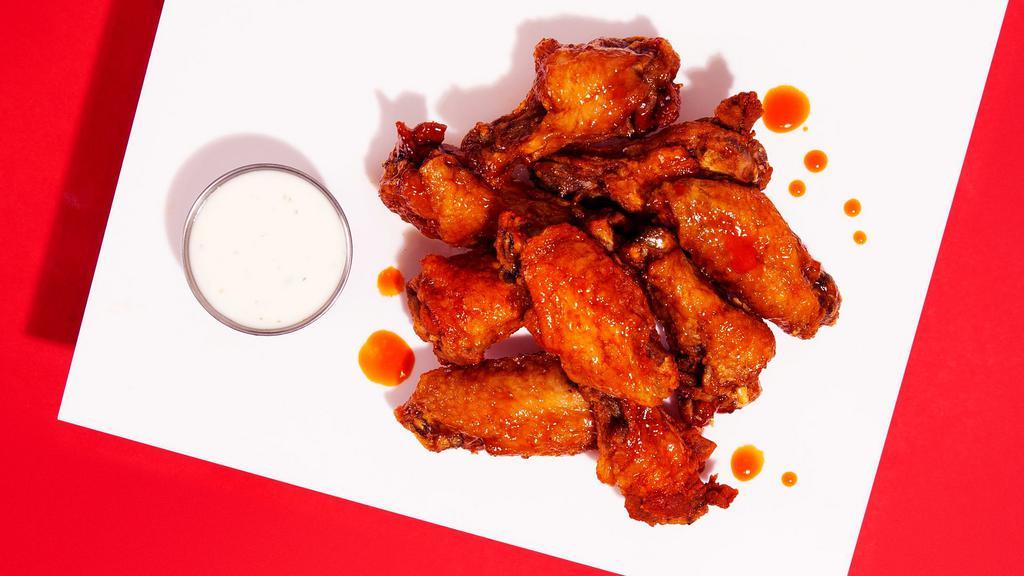 10 Chicken Wings · Crispy and juicy chicken wings with your choice of sauce!