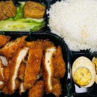 Deep-Fried Chicken Cutlet Rice/炸鸡排饭 · Marinated egg, vegetable, marinated fried bean curd and soup of day.