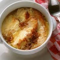 Onion Soup Au Gratin · Croutons topped with melted cheese.