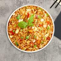 Thai Rice Saloon · Stir fried rice with egg, tomato, onion, scallion, carrot and Chinese broccoli.