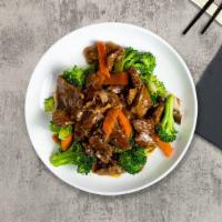 Greens And Beef · Sauteed flank steak with American broccoli in brown sauce.