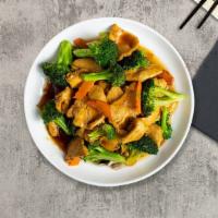 The Green Chicken · Sautéed chicken with American broccoli in brown sauce.