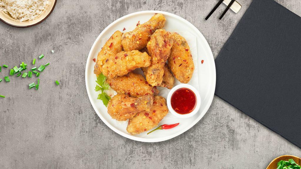 Thai Chicken Wings · Thai-style chicken wings. Served with sweet chili sauce.