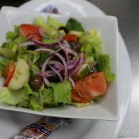 House Garden Salad · Mixed field greens, diced tomatoes, peppers, onions, cucumbers, egg, croutons and garnish.