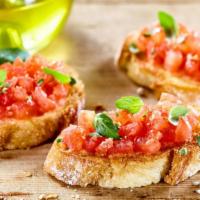Bruschetta · Grilled garlic rubbed bread topped with chopped tomatoes, garlic, olive oil, and balsamic vi...