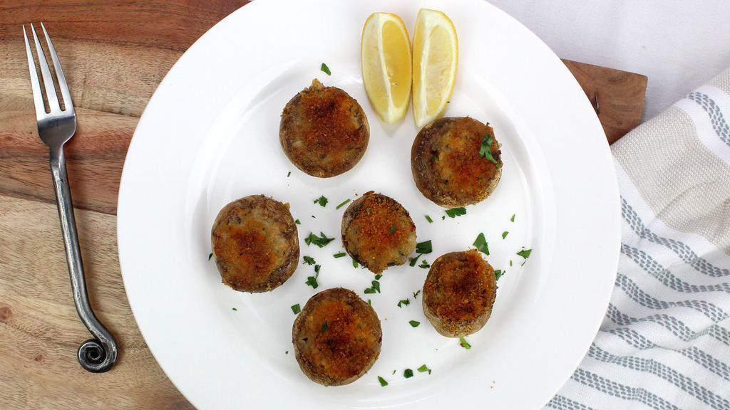 Stuffed Mushrooms · 6 pieces. Stuffed with crab meat.