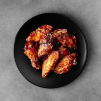 25 Pieces Classic Chicken Wings · 25 pieces of traditional chicken wings done in sauces of choice, served with a side of celer...