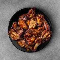 75 Pieces Classic Chicken Wings · 75 pieces of traditional chicken wings done in sauces of choice, served with a side of celer...