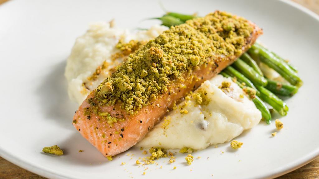 Pistachio Crusted Salmon · Served with truffle mash potato and haricot verts.