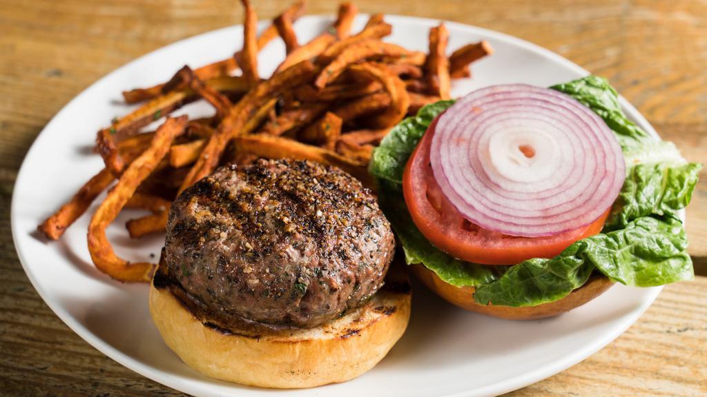 Lamb Burger · On a roll, served with sweet potato fries.