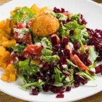 Roasted Beet Salad · Goat cheese fritter over arugula and beets.