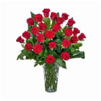 Grande Roses - 2 Dozen Roses · Two dozen premium roses designed with specialty foliage in a clear vase.