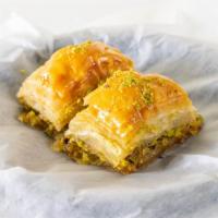 Pistachio Baklava · World famous
More than 100 layers of see-thru thin dough
Pistachio crumbles
Honeyish Syrup