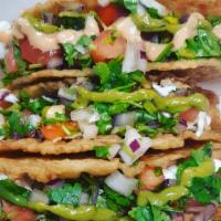 Especialidad Friztanga Cibao / Friztanga Cibao Specialty · Tacos dominicanos. Tortilla de plátano rellenos de pico de gallo, salsa chimi y su opción de...