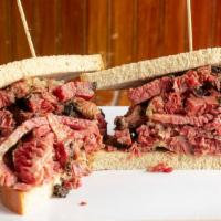 Corned Beef & Pastrami Sandwich · served on rye, hero or roll bread with spicy mustard