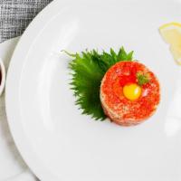 Spicy Salmon Or Tuna Tartar · Spicy salmon or spicy tuna with tempura flake and quail egg, tobiko on top.