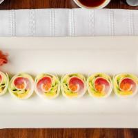 Cucumber Special · Tuna, salmon, white fish, tamago, avocado and tobiko wrapped with cucumber.