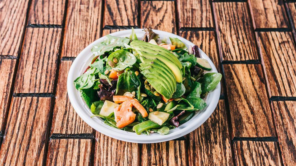 House Salad · Baby lettuce, avocado, onion, tomato, peppers, cucumber and balsamic vinaigrette, topped with pumpkin seeds