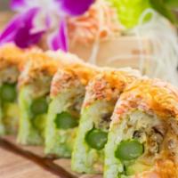 Super Crab Roll · Inside: Soft shell crab, lobster salad, avocado and asparagus. Outside: Spicy kani salad, sc...