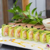 Caterpillar Roll · Inside: Shrimp tempura, lobster salad, crabstick and cucumber. Outside: Avocado and tobiko. ...