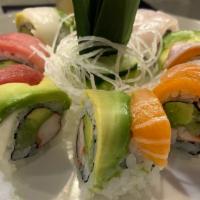 Rainbow Roll · Inside: Kani cucumber and avocado. Outside: Tuna, salmon, yellowtail and white fish.