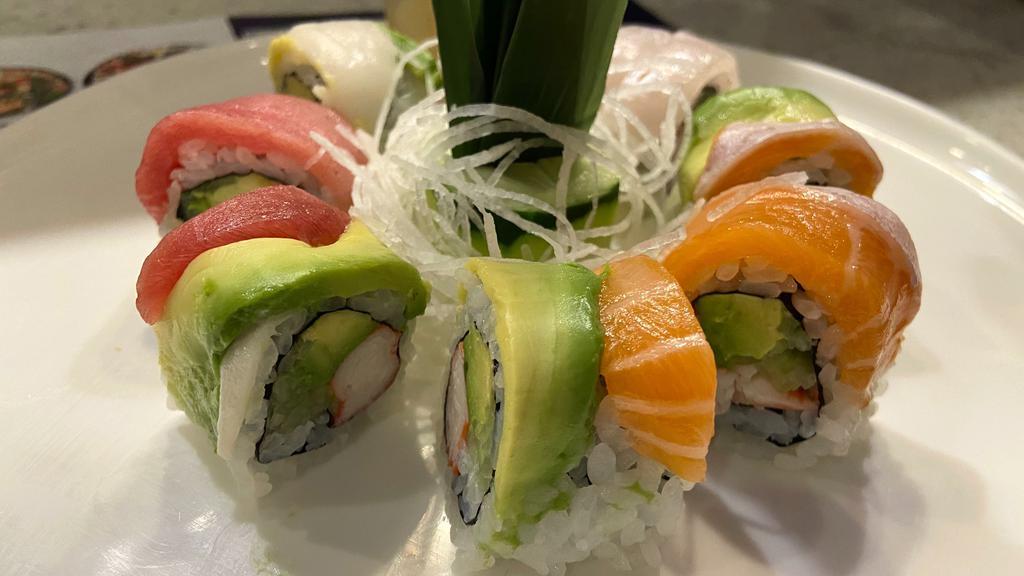 Rainbow Roll · Inside: Kani cucumber and avocado. Outside: Tuna, salmon, yellowtail and white fish.