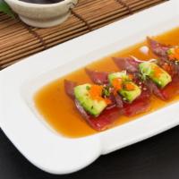 Tuna Tataki · Sliced seared tuna, onion, avocado, scallion and masago. Served with ponzu sauce.