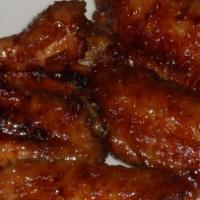 Chicken Wings With Garlic Sauce (4Pc) · Hot and spicy.