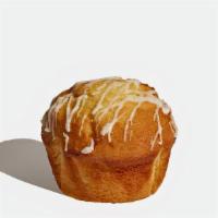 Lemon Muffin · This delightful lemon cake is drizzled with icing.