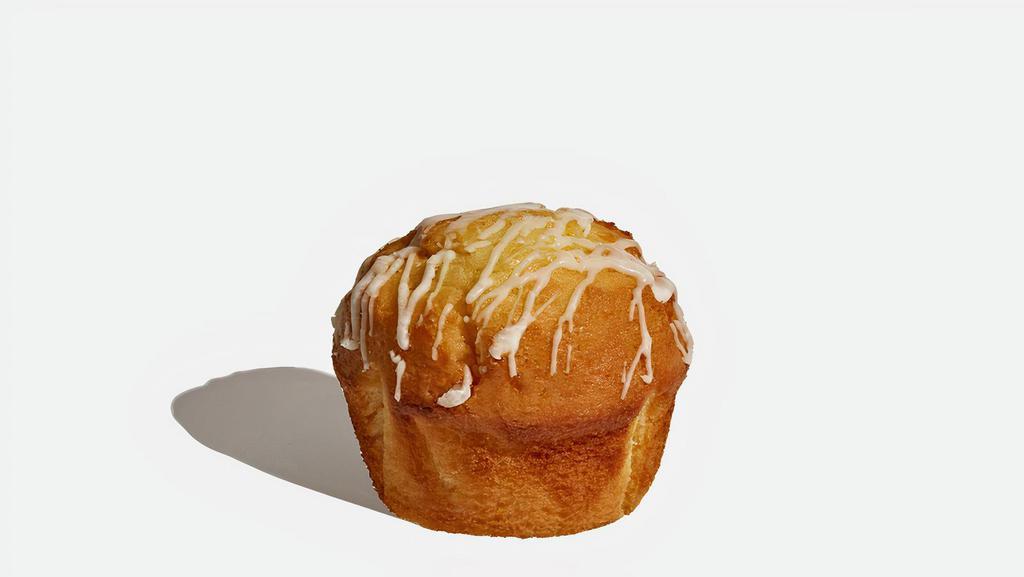 Lemon Muffin · This delightful lemon cake is drizzled with icing.