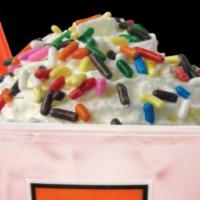 Magic Milk · Cold milk, your choice of flavor, topped with Whipped Cream and Sprinkles