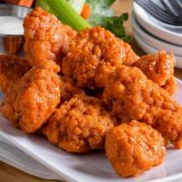 Boneless Wings · Served with your choice of sauce: buffalo, red chili, honey BBQ or plain. Two sizes – regula...