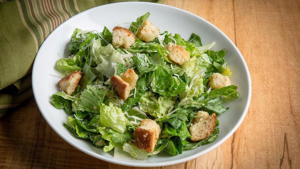 Caesar Salad (Family Size) · Crisp romaine with croutons and imported parmesan. Served with creamy Caesar dressing.  Dressing is served on the side.