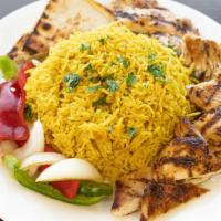 Grilled Chicken Over Rice · Peppers, Onions, White Sauce.