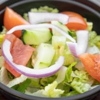 Garden Salad · Lettuce, Tomato, Onions, Cucumber & Dressing.