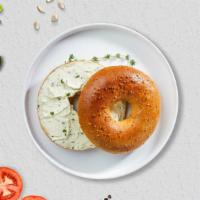 Bagel With Cream Cheese Sandwich · Boiled and baked round bagel of your choice with our special cream cheese!